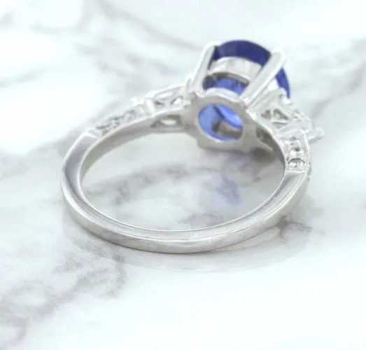 2.88ct Oval Blue Sapphire Ring with Diamond Accents in 18K White Gold