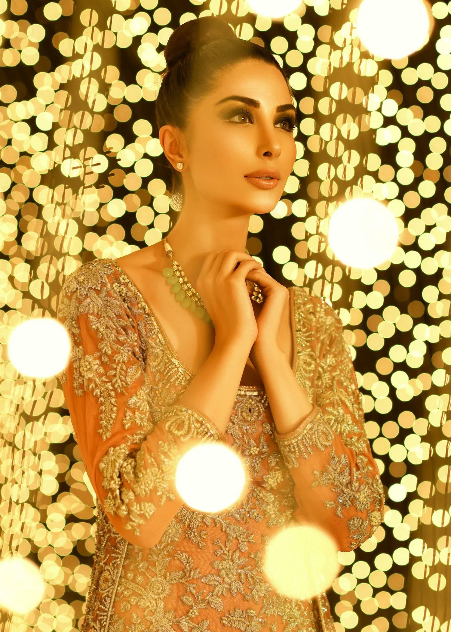 Embroidered gown in peach color with golden embroidered work # B3373