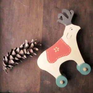 folkloric reindeer push toy