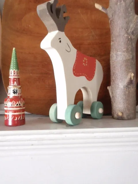 folkloric reindeer push toy