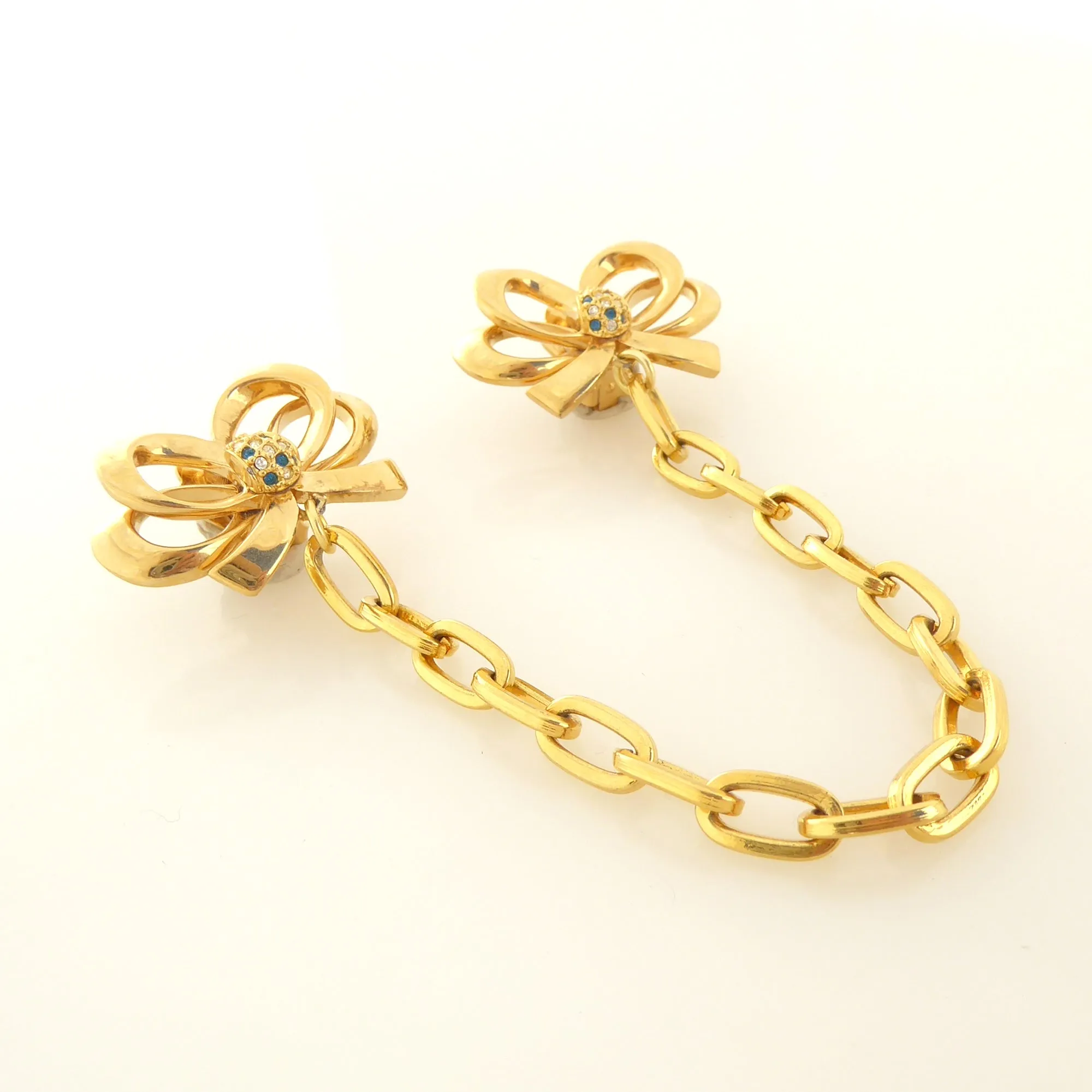 Gold bow collar clips
