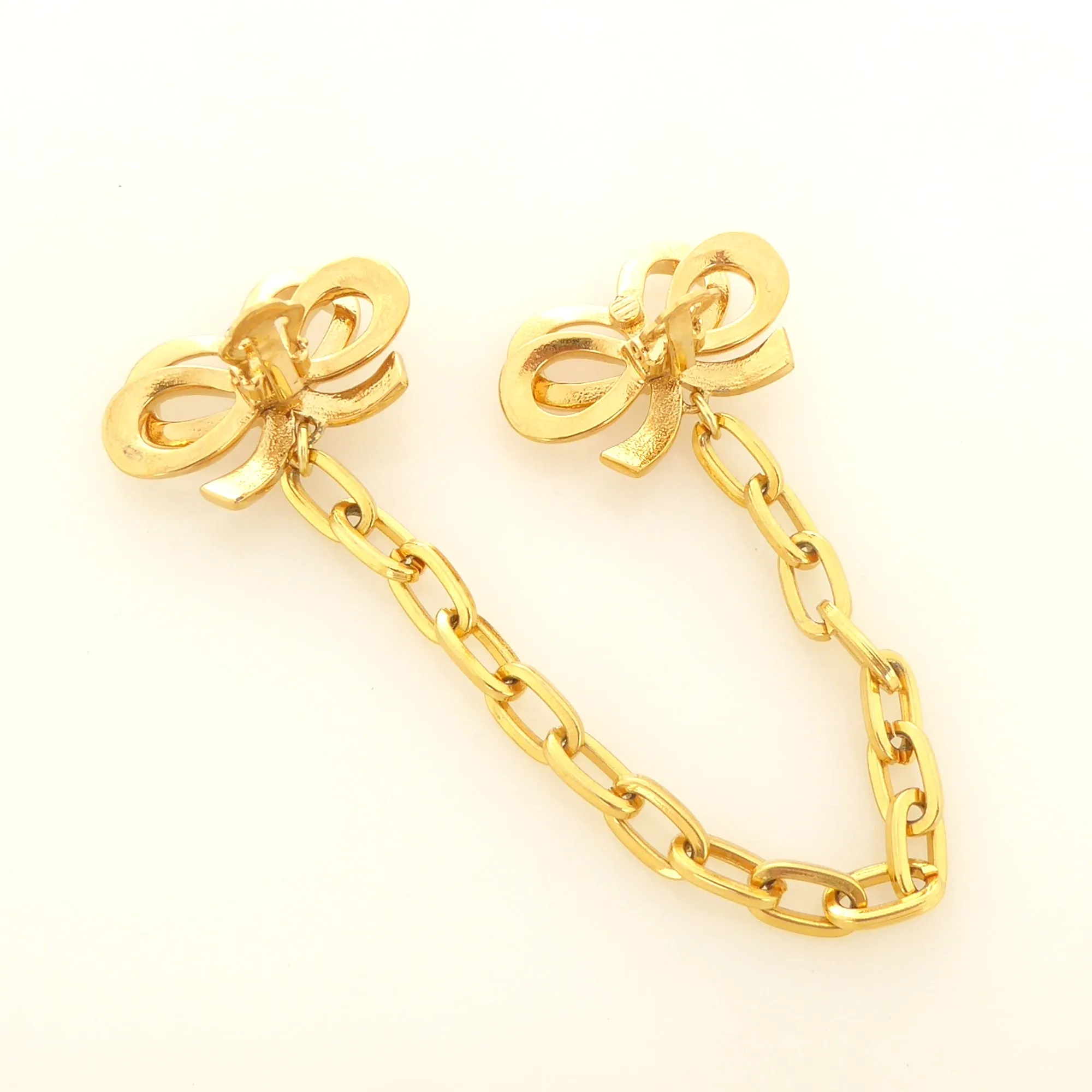 Gold bow collar clips