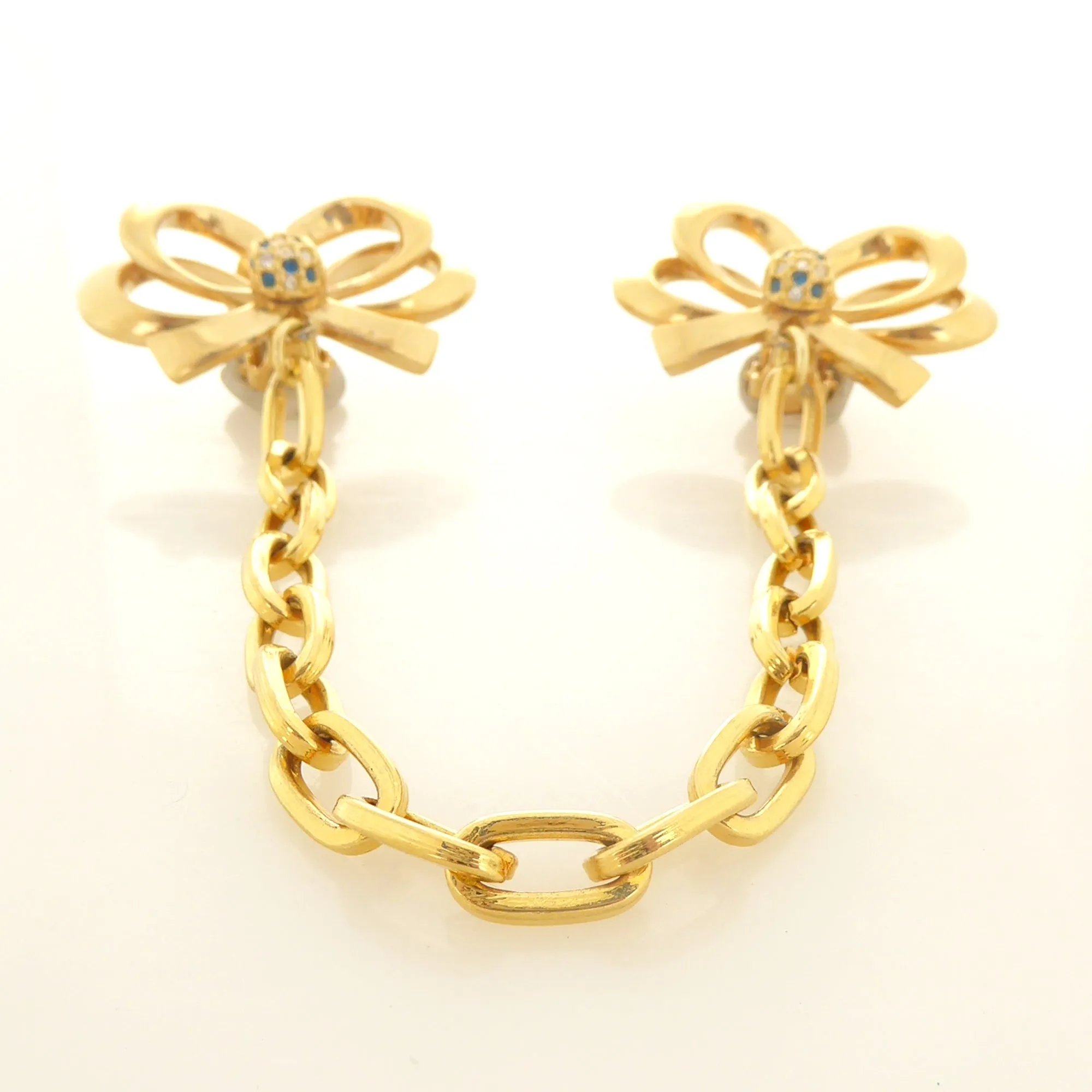 Gold bow collar clips