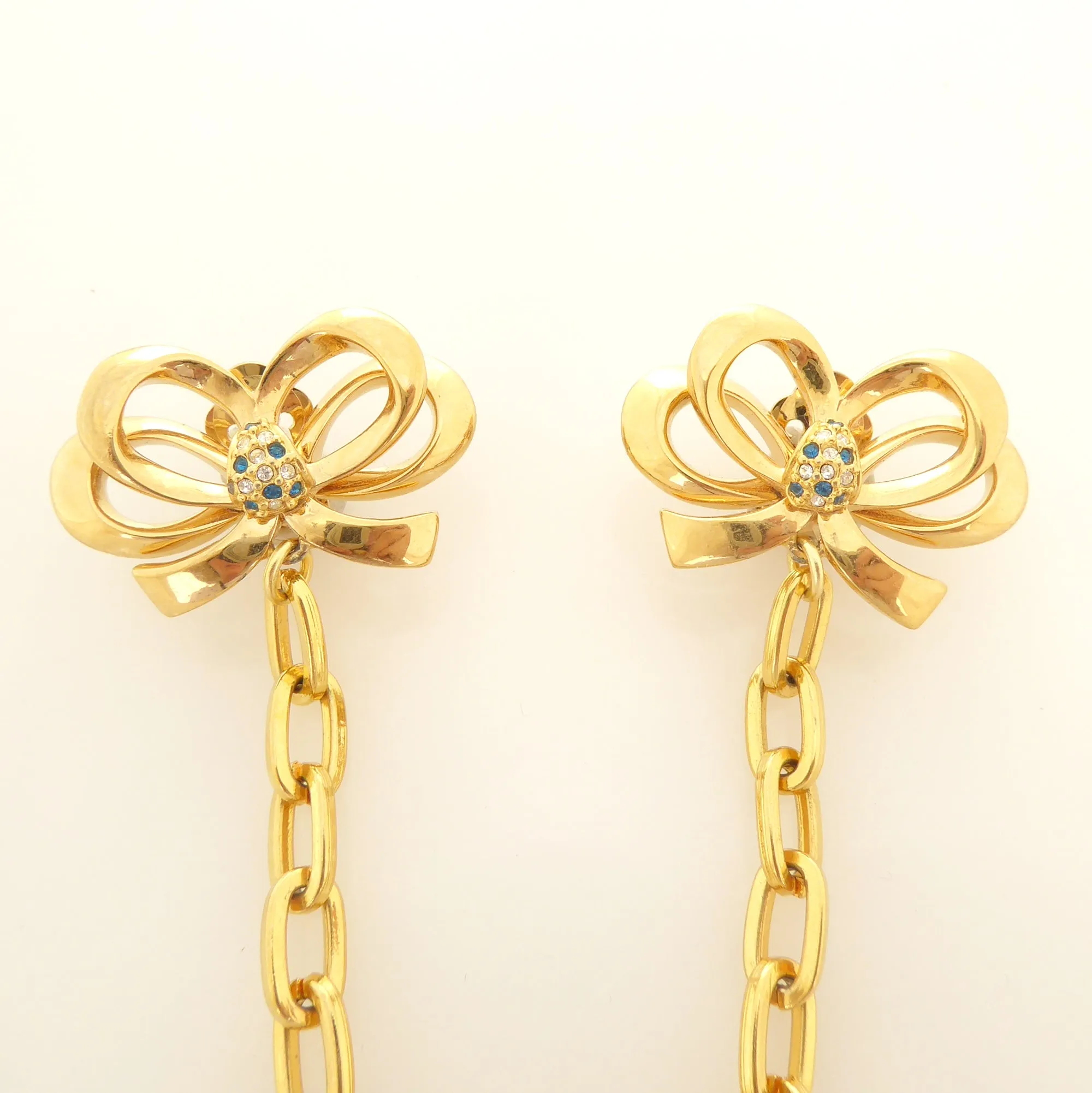 Gold bow collar clips